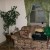 Loveseat in front of the window that leads to the outside bbq area and picnic table Loveseat in front of the window that leads to the outside bbq area and picnic table