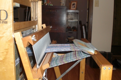 Weaving loom takes over old home office.