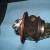 4- Now you will have something similar to this in front of you. Remove the o-ring around the compressor seal of the center section. (Orange o-ring in picture) Grab your 10mm socket for the shaft nut on the compressor side and your 12mm wrench for th 4- Now you will have something similar to this in front of you. Remove the o-ring around the compressor seal of the center section. (Orange o-ring in picture) Grab your 10mm socket for the shaft nut on the compressor side and your 12mm wrench for th