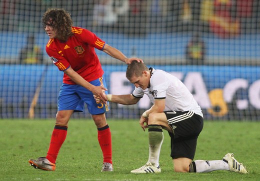 Puyol (Red) scored for Spain in the Semifinal match against Germany