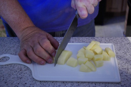 The smaller you chop the potatoes, the quicker they'll cook up for the Cheesy Potato Soup.