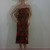Tied the sarong at chest level to form a tube dress. Tied the sarong at chest level to form a tube dress.