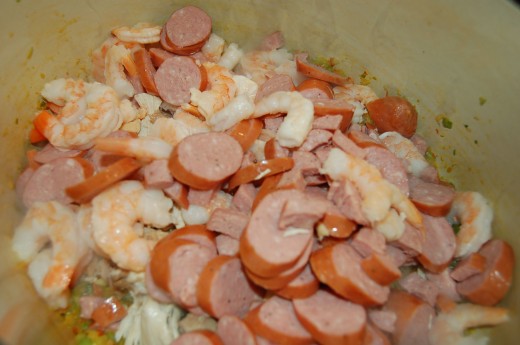 Add Chicken, Sausage and Shrimp to Cajun Jambalya