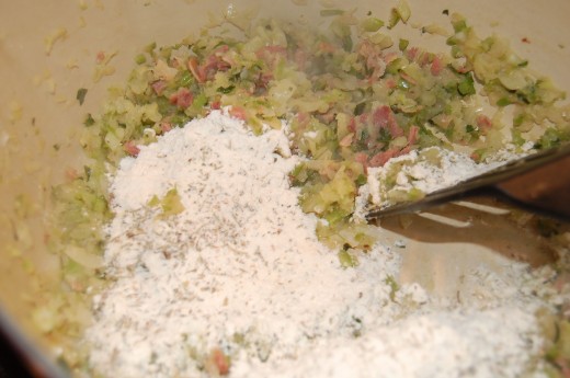 Making a Roux by adding Flour, Herbs and Garlic Powder Making a Roux by adding Flour, Herbs and Garlic Powder