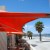 The cafe fronts onto the St Kilda boardwalk which is prime people watching real estate The cafe fronts onto the St Kilda boardwalk which is prime people watching real estate