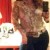 Hot woman wearing casual jeans and knee high boots with a tan blouse street style. Hot woman wearing casual jeans and knee high boots with a tan blouse street style.