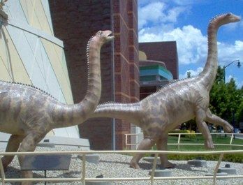 These dinosaur twins have already broken out and are almost to the street!