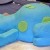 Cut and assembled from many different cakes. Center was rounds, other parts cut from large oblong cake. Cut and assembled from many different cakes. Center was rounds, other parts cut from large oblong cake.