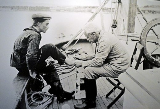 Grenfell doctoring a sailor's foot.  I photographed photo that was on the wall at the Grenfell Museum.