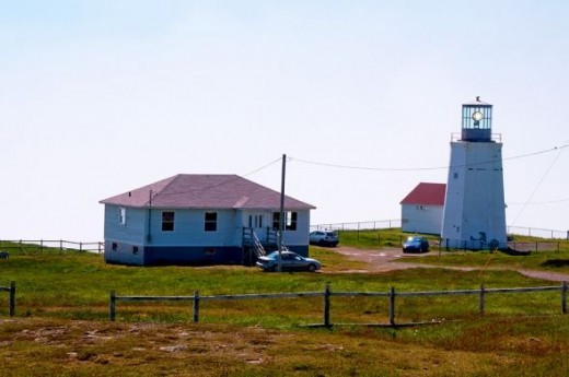 The historic building behind the tower was once home to the lighthouse keeper but is now open to the public as an Interpretive Centre.