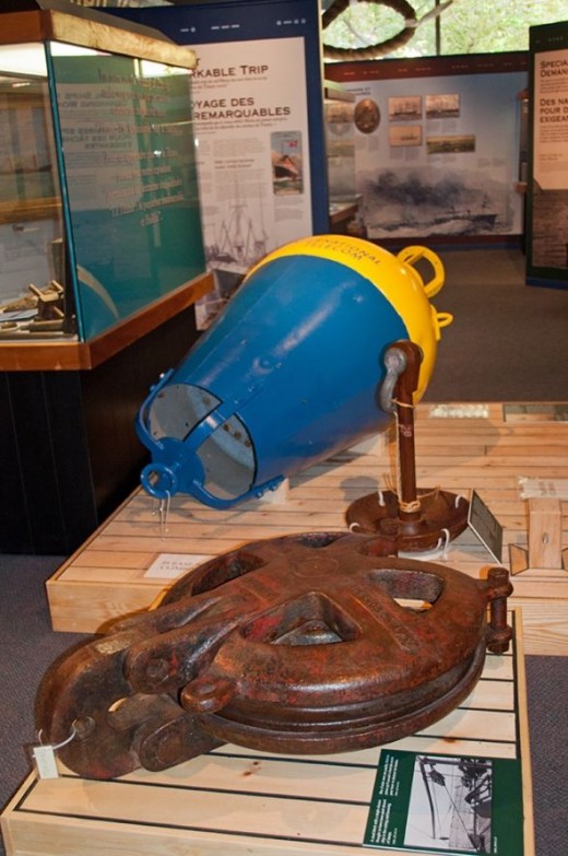 A buoy and ship's pulley.