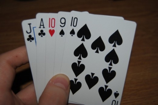 First instinct: you have two of the highest trump if you call clubs. At the same time, if you call spades, you'll have three trump and an off ace. Spades is the suit to call.