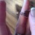 Slide your beads to the middle of your piece to meet the charm. Slide your beads to the middle of your piece to meet the charm.