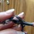 Once your bead is crimped shut and secure, carefully cut the tail end of the cord. Beautiful! Once your bead is crimped shut and secure, carefully cut the tail end of the cord. Beautiful!