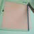 Cut a piece of scrapbooking paper to fit. If your base is longer or wider than 12", you might need two pieces. Cut a piece of scrapbooking paper to fit. If your base is longer or wider than 12", you might need two pieces.