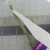 6. With the jig threaded, when the time is right, carefully slide the jig through the front pocket of the album. 6. With the jig threaded, when the time is right, carefully slide the jig through the front pocket of the album.