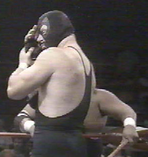 Again A Young Undertaker In Mask
