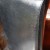 Leather dining room chair with color loss and cat scratches Leather dining room chair with color loss and cat scratches