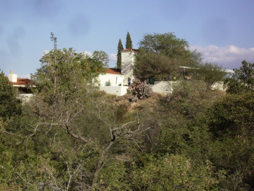 The Kannally family home situated on top of a hill overlooking the park.  The home, which is now a museum, along with the surrounding land and buildings was donated by Lucile Kannally in her will to the State of Arizona to be used as a park.