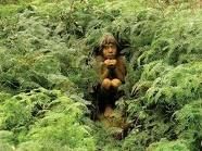 This little boy looked cheeky hiding in the bushes, he looked eerily real.