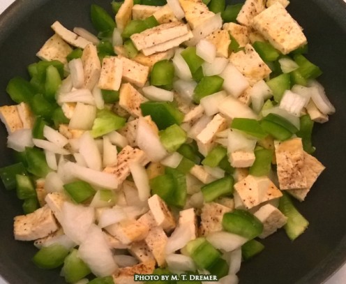 Double frying the finished tofu strips (pictured here) will further enhance the texture and flavor. See below for my personal favorite dish.
