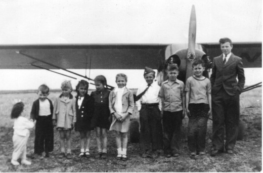 My father's Airplane - That's me on the far left.