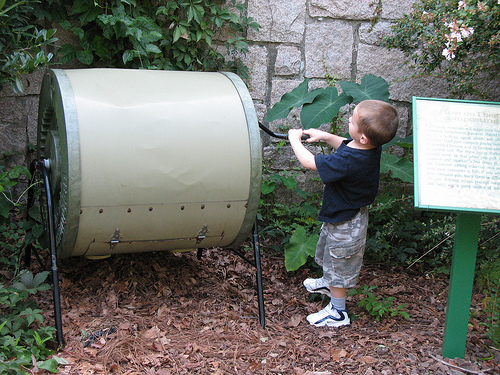 A crank operated drum compost tumbler. Photo by hoyasmeg.