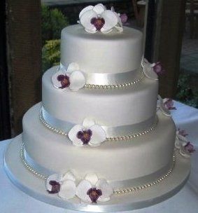 Orchid Wedding Cake - orchids made from sugar paste moulds, pearls are cheap costume jewelery strands