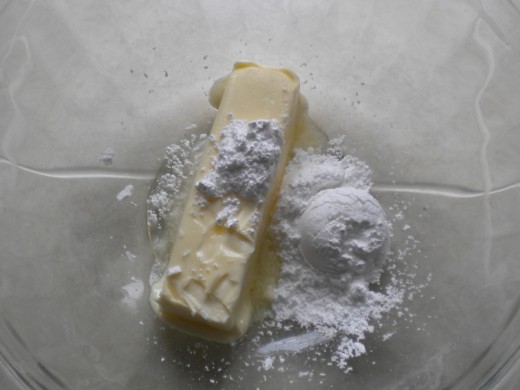 Let's start with unsalted butter and powdered sugar and combine them together.