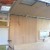 View in the side door showing the roof vents in and the side window in and part of the wall paneling fitted View in the side door showing the roof vents in and the side window in and part of the wall paneling fitted