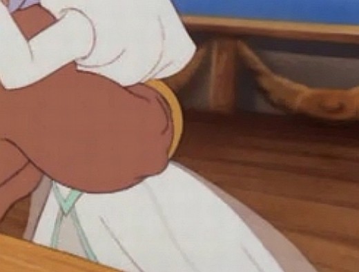 Dress side. The sheer fabric is the veil which has been pulled against the dress by Triton's arm