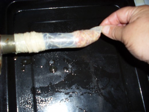 Sausage mince starting to fill up the sausage casing.