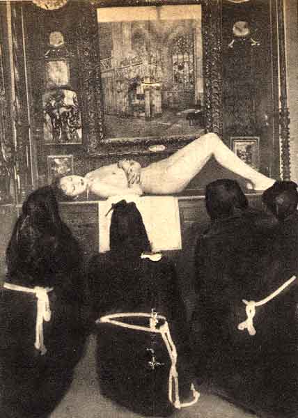 A ritual with Maria on the altar, and Evola as one of the robed figures