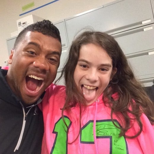 Great shot of Russell with young Brooke in the Seattle Childen's Hospital