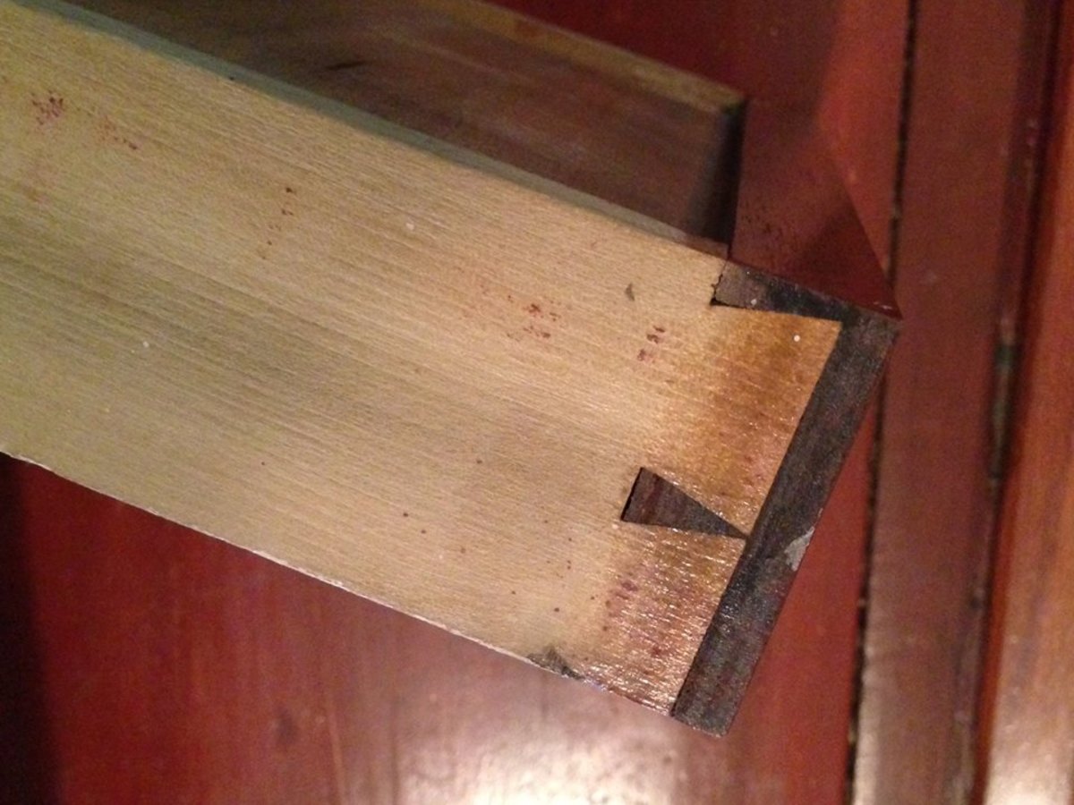 Narrow dovetail joints on small drawer.