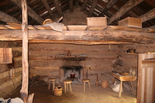 Inside a trappers log cabin at Conner Prairie living history museum in Fishers, Indiana. Photo by Derek Jensen en.wikipedia.org/wiki/File:Conner-prairie-log-cabin-interior.jpg