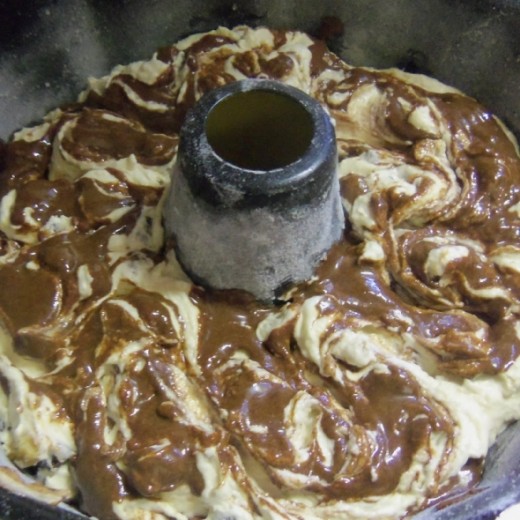 Using a knife or spoon, swirl the mixture lightly into the batter.