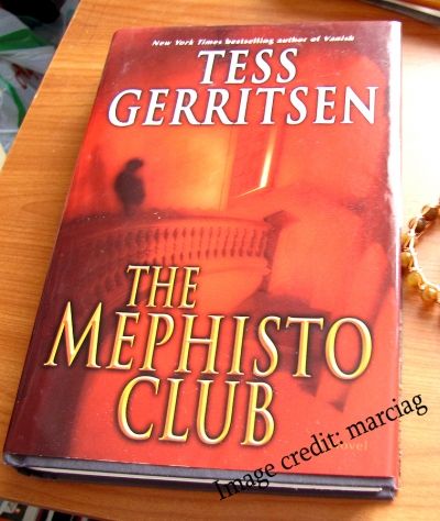 My harcover edition of Mephisto Club, it's already battered and tattered from use)