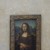 Mona Lisa is a tiny painting which can only be viewed from about 15m away. Tough to get the the front line Mona Lisa is a tiny painting which can only be viewed from about 15m away. Tough to get the the front line