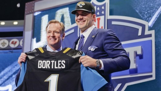 Blake Bortles standing with Roger Goodell after being selected #3 overall by the Jacksonville Jaguars