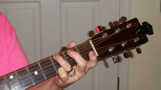 G is on the 6th string at the third fret, third finger.