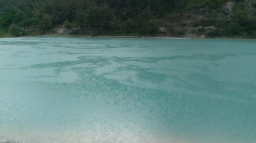 Clear emerald waters of Lan Yue Gu in Lijiang, Yunnan.