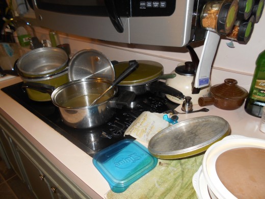 After this marathon cooking session, there were, of course, tons of pots and pans and dishes to wash. Who to help with the clean-up? I guess I'll have to chalk it up to "what parents won't do for their children!" Plus, I know she appreciates it :)