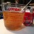 Two beef bouillon cubes dissolved in water.