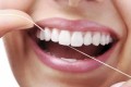 How to Properly Floss Teeth