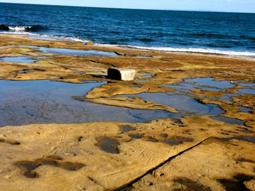 Further down the beach