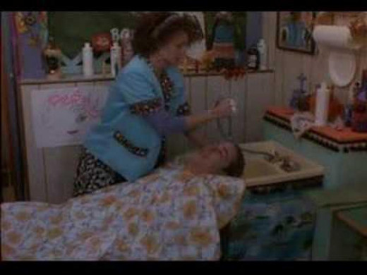 A wash and set for Mike Downey (Matthew Modine) as given by Michelle Pfeiffer in Married to the Mob