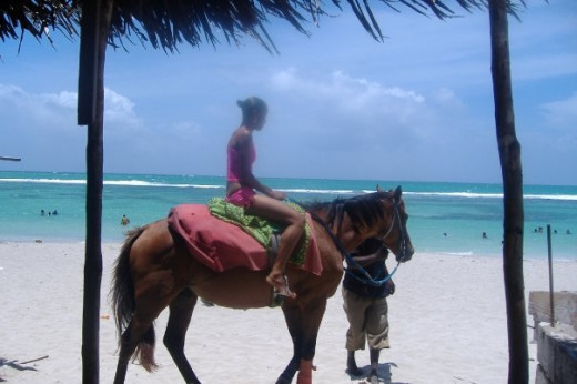 Horseback riding on the Hellshire beach in St. Catherine, Jamaica