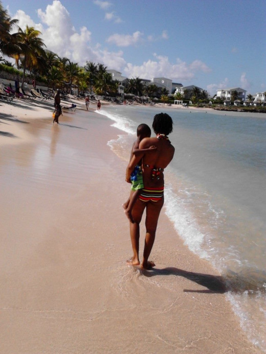 Strolling on the Grand Palladium Beach with my toddler