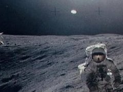 This now infamous photograph clearly shows a UFO above a NASA astronaut as he walks on the Moon.